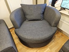 DFS Swivel Cuddle Chair