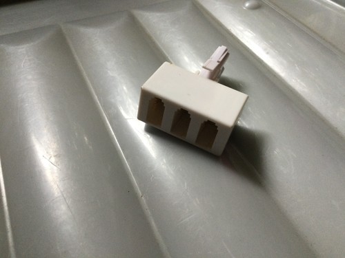 Telephone adapter three - bt,