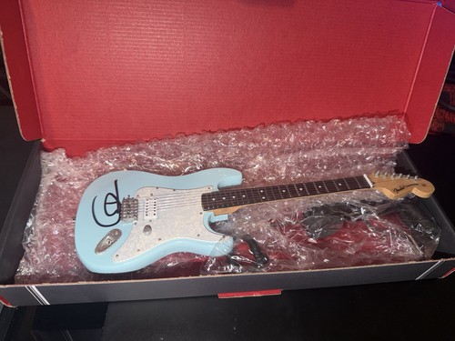 Autographed tom delonge - tom,