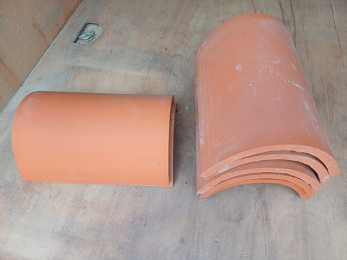 New half round clay - half, roof