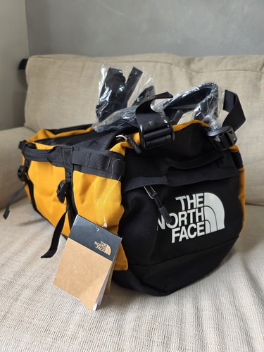 The north face yellow - north, and