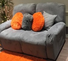 Free to take away. Used 2 seater recliner sofa. Grey fabric. Works well.