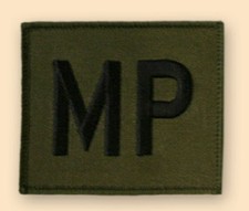 NEW OFFICIAL MP Badge, subdued.