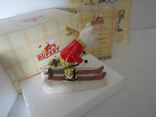 Rupert takes ski ing lesson - rupert, a
