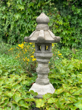 Stone japanese pagoda statue