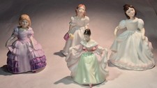 FOUR ROYAL DOULTON Figurines -