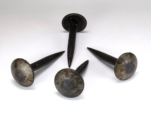 Hand forged long iron nails - hand,