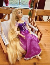 DISNEY STORE RAPUNZEL DOLL - 16 INCH - SINGING DOLL