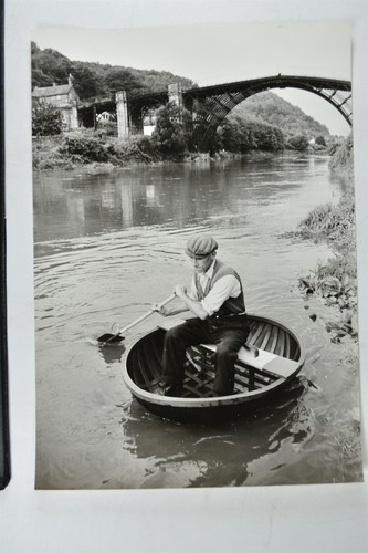 Man coracle river iron - river, bridge