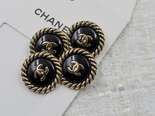 Set of 4 of vintage Chanel buttons. Black with Gold trim 1 in/ 25 mm