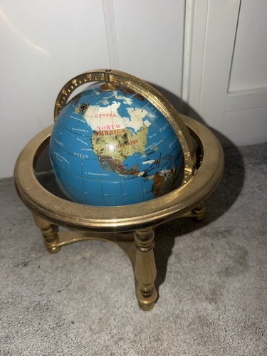 Light blue gemstone globe with - light,