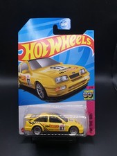 Hot Wheels Ford Sierra Cosworth Yellow sealed USA Kroger cracked blister. Rare