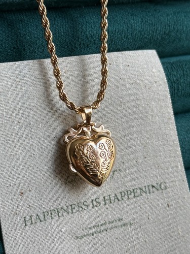 Gold tone heart locket - tone,