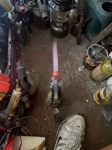 Paraffin blow lamp working - paraffin,