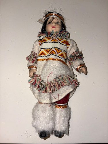 Ceramic dolls ethnic dresses