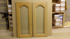 pair of light oak wooden kitchen cabinet glass doors 715mm h x 297mm w-good cond