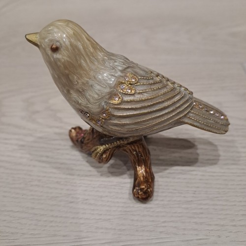 Enamelled and bejewelled - and,