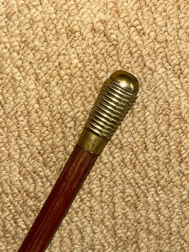 Antique flexible whip swagger - antique,