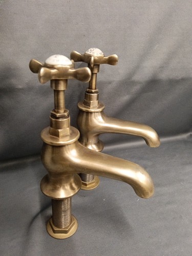 Rudge bath taps aged - e.,