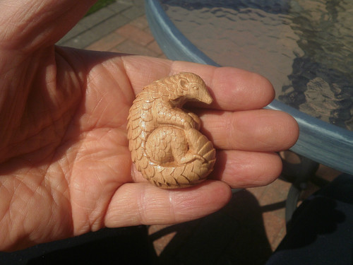 Carved wood netsuke pangolin