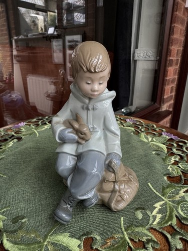 Lladro nao boy with pet - lladro,