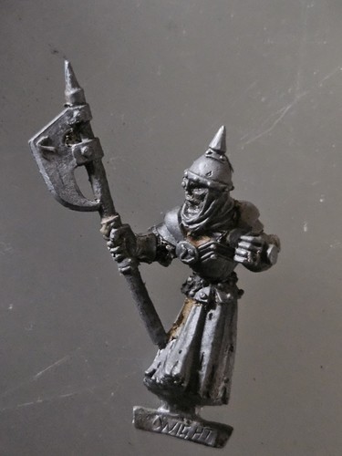Armoured wight with axe metal - axe,
