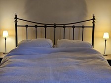 Victorian style brass & metal kingsize headboard with wooden spacer blocks