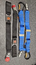 Wheelchair securing straps