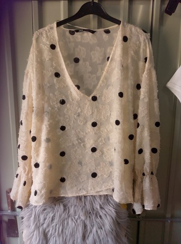 Cream with black dots - black, dots.