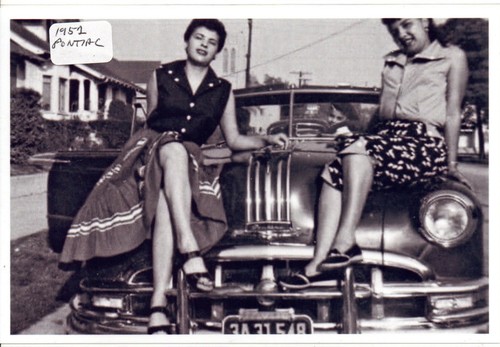 Two ladies sitting - two, a