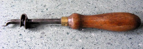 Antique adjustable tin opener - adjustable,