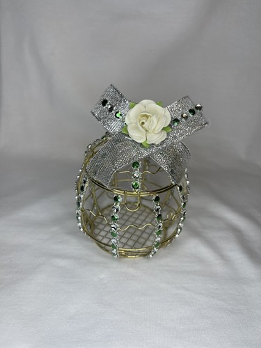 Hand decorated metal bird - hand, cage