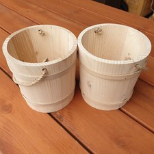 Wooden bucket with a rope as a