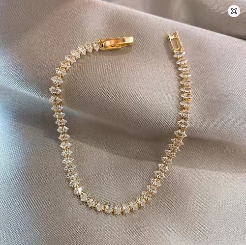 Gold tone tennis bracelet - tone,