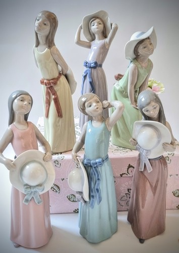 Lladro girl with straw hat