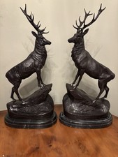 Pair of bronze stags on marble