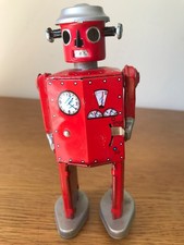 VINTAGE TOBAR CLOCKWORK TIN