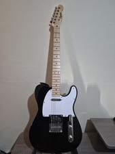 Squier by Fender Debut