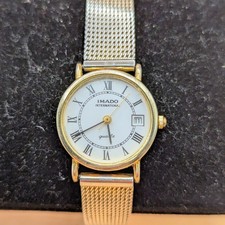 Lovely Imado ladies quartz gold tone watch with date. Working. New battery.