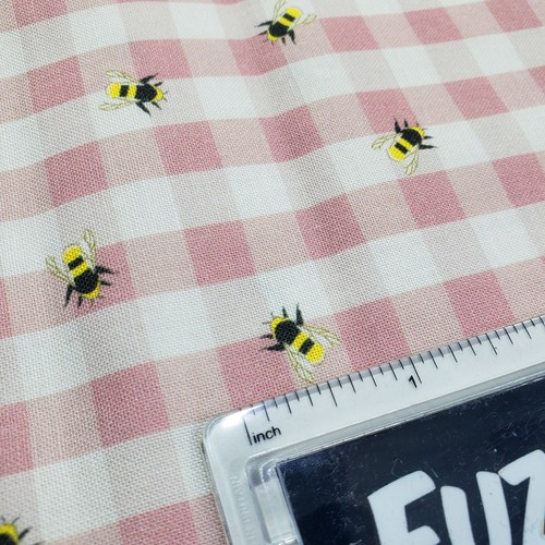 Pink gingham picnic and bees