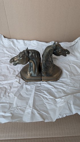 Pair vintage metal horses - pair,