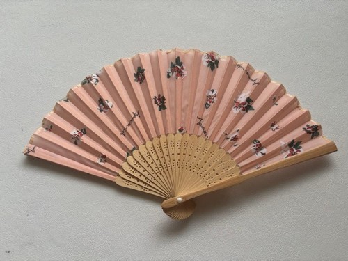 Pink floral fan with wooden