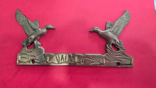 Vintage brass flying ducks key - brass,