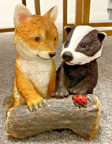Resin hand painted badger cub - hand,