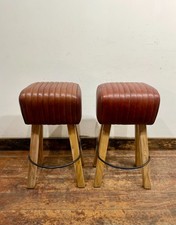 Pair of pommel stools with