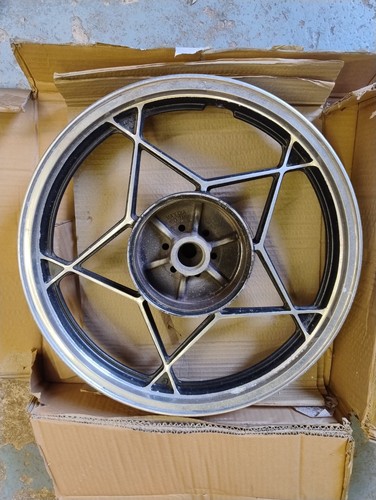 Suzuki gt250 rear wheel - x7,