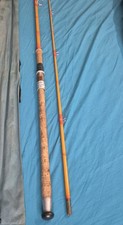 A VINTAGE 9FT SPINNING ROD
