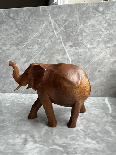 Hand carved light brown - carved,