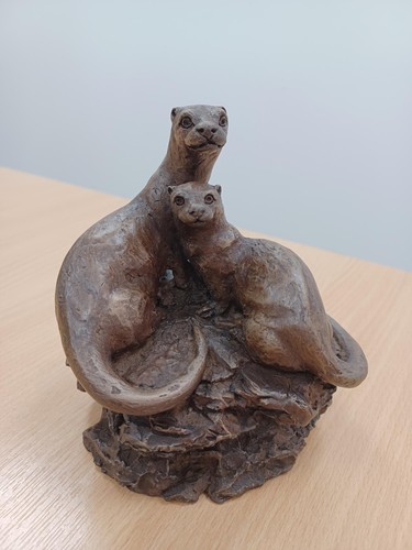 Pai otters sculpture tanya - or,