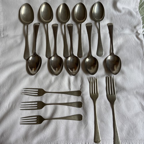 Various mismatched spoons and - mismatched,